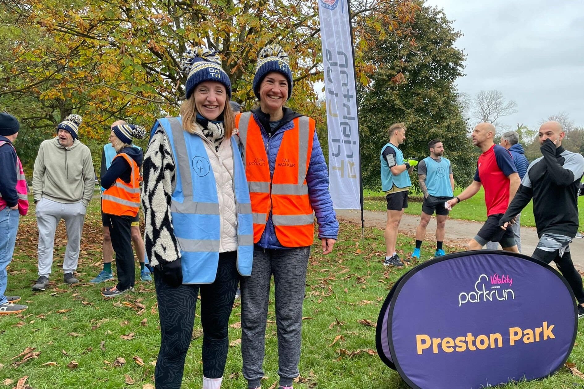  volunteers sophie and harriet in bri tri bobble hats at the preston park takeover 